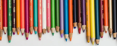 Colored pencils in a row