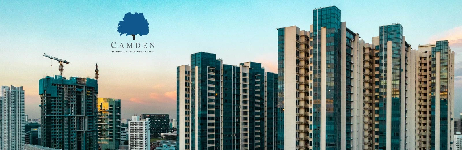 Many skyscrapers, part of a city skyline.