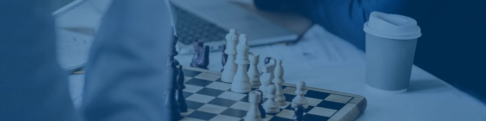 Chess game and laptop