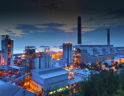 Natural gas plant with the ocean in the background